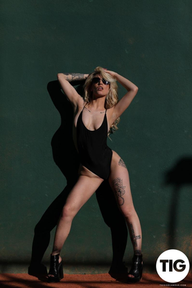 Saskia Valentine Shooting in Her Bodysuot