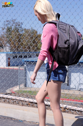 Light-haired teen Sammie Daniels takes a ultra-cute walk after ending her classes
