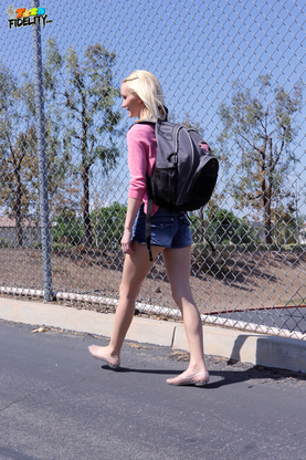 Light-haired teen Sammie Daniels takes a ultra-cute walk after ending her classes