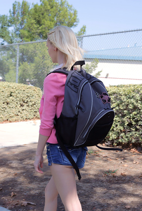 Light-haired teen Sammie Daniels takes a ultra-cute walk after ending her classes