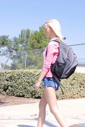 Light-haired teen Sammie Daniels takes a ultra-cute walk after ending her classes