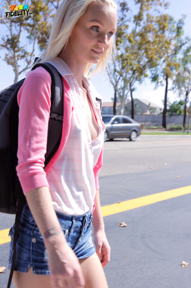 Light-haired teen Sammie Daniels takes a ultra-cute walk after ending her classes