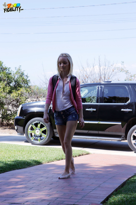 Light-haired teen Sammie Daniels takes a ultra-cute walk after ending her classes