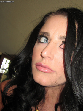 Bodacious dark-skinned-haired Sophie Dee whips out her thick melons from swimsuit at The Madison's