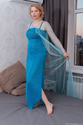 Elegant honey Uli liquidates her dress and lingerie to finger her fur covered honeypot