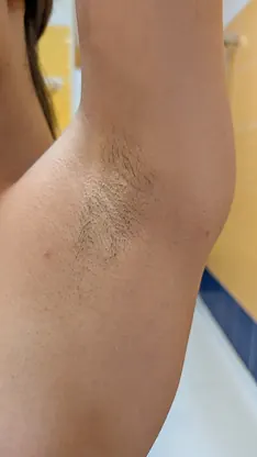Katie Noir's hairy armpits trimmed while posing in bare pussy in glamourous pose