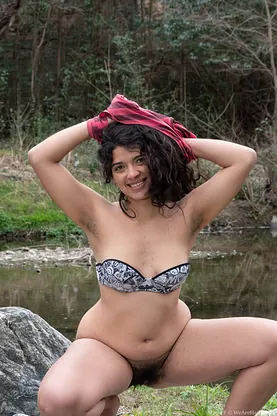 Maria F flaunts shaggy bush & all-natural tits outdoors