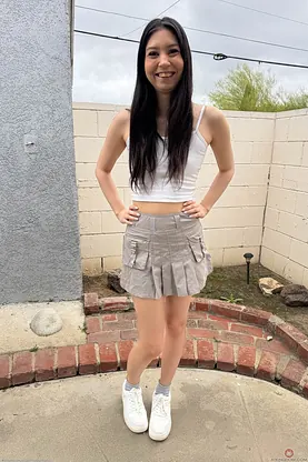 Amber Angel shows off her petite frame and seduces her GF with a hot spread