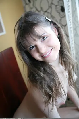 Linnda flaunts her puny tits and shaved pussy in a solo show