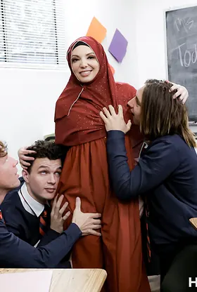 Kiki Daire teaches Arab slut how to handle a hard cock like a pro in hijab