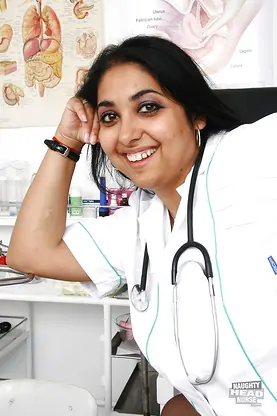 Mature Indian nurse Alice flaunts her big tits & tight lingerie in a hot clinic