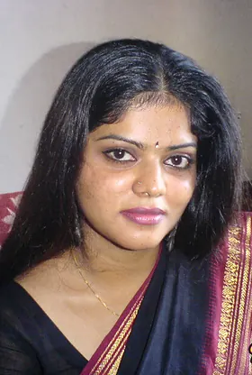 Indian babe Neha strips down and reveals her hairy legs and nipples in a public apartment