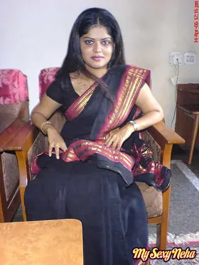Indian babe Neha strips down and reveals her hairy legs and nipples in a public apartment