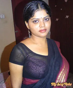 Indian babe Neha strips down and reveals her hairy legs and nipples in a public apartment