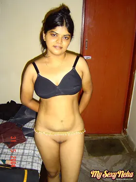 Indian babe Neha strips down and reveals her hairy legs and nipples in a public apartment