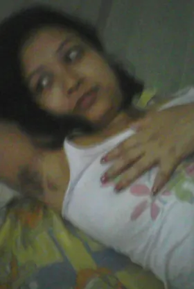 Watch as Indian wifey Padmaja Gogoi flaunts her naturals & nipples on the couch