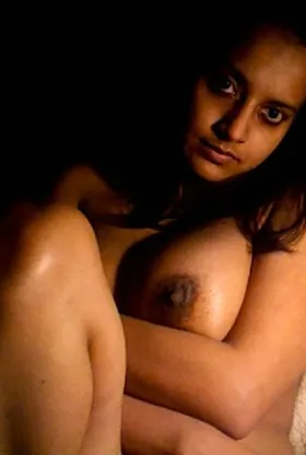 Indian babe with massive natural boobs gropes her pussy in her room with glasses on