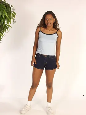 Watch this Indian beauty spread her legs and stroke solo in socks and boots