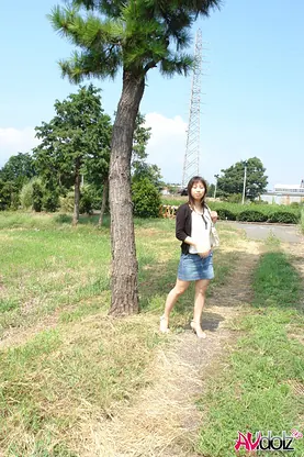 Karin Asahi uncovers her massive tits & wet pussy in the great outdoors