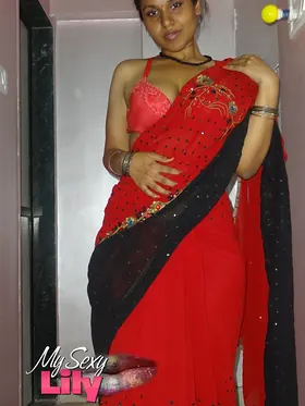 Lily Singh's Indian Solo in Scarlet Sari: Uncovers Her Natural Melons
