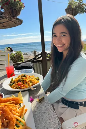 Naughty Japanese teen Brianna Arson strips naked and wets herself on the beach