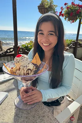 Naughty Japanese teen Brianna Arson strips naked and wets herself on the beach