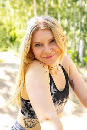 Katja E, the blonde with Platinum hair, wanks off after a wild ride on her mountain bike