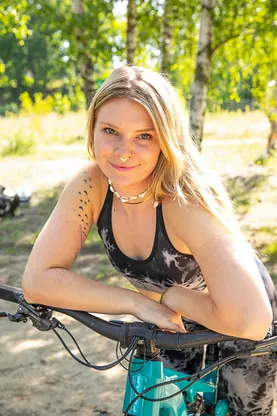 Katja E, the blonde with Platinum hair, wanks off after a wild ride on her mountain bike