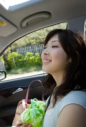 Watch Saki Koto flaunt her beach body and knockers in a hot outdoor show