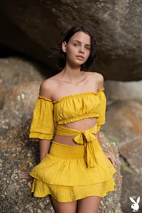 Watch Lilit Ariel's stunning body take off on the beach and reveal her perfect assets