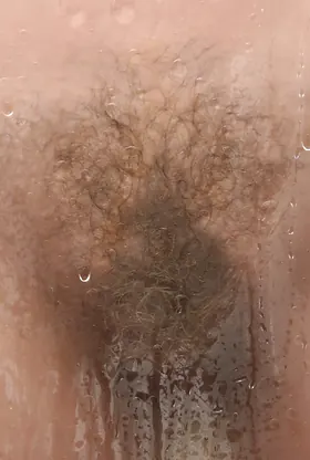 Cecelia flaunts her shaved pussy and juicy ass in the shower with her puny bra-strap collection