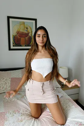 Watch stunning colombian babe Paulette Donceles flaunt her massive caboose and show off her suntanned tits in solo lingerie