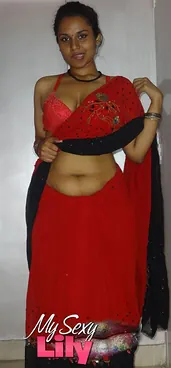 Lily Singh's Indian Solo in Scarlet Sari: Uncovers Her Natural Melons